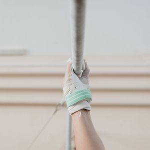 Close up of a man hands gripping a bar